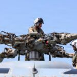 John Finn Conducts Flight Quarters [Image 3 of 3] - DVIDS