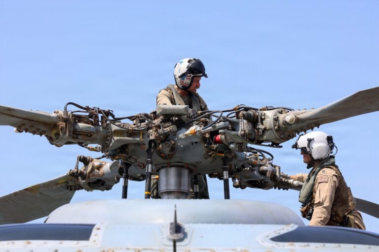 John Finn Conducts Flight Quarters [Image 3 of 3] - DVIDS
