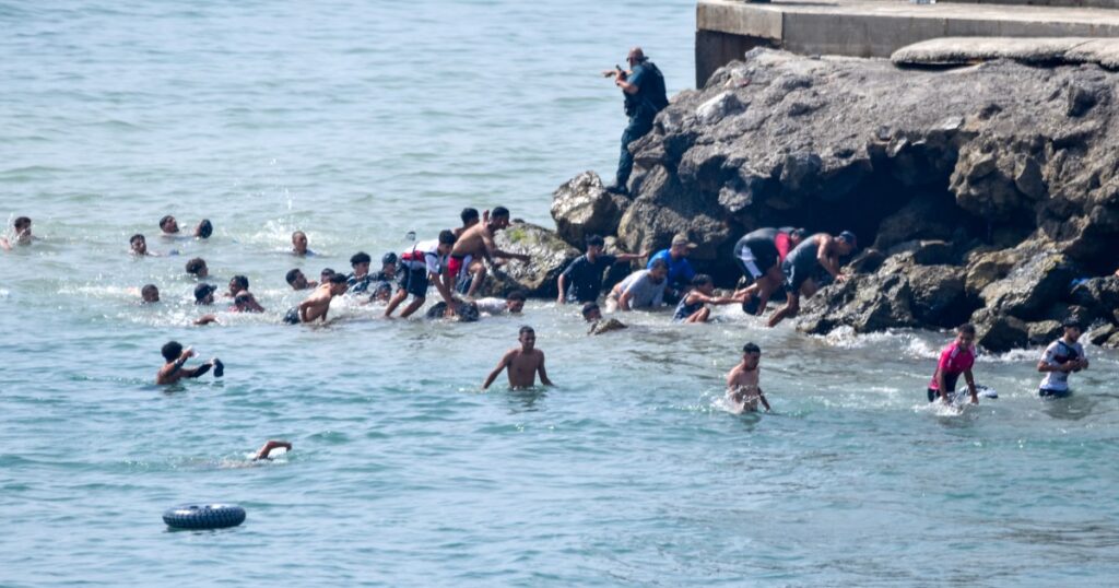Thousands break through border of Morocco into Spain’s African Ceuta enclave - NBC News