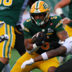 Justin Rankin bounces off the defenders and sprints to the end zone - CFL.ca