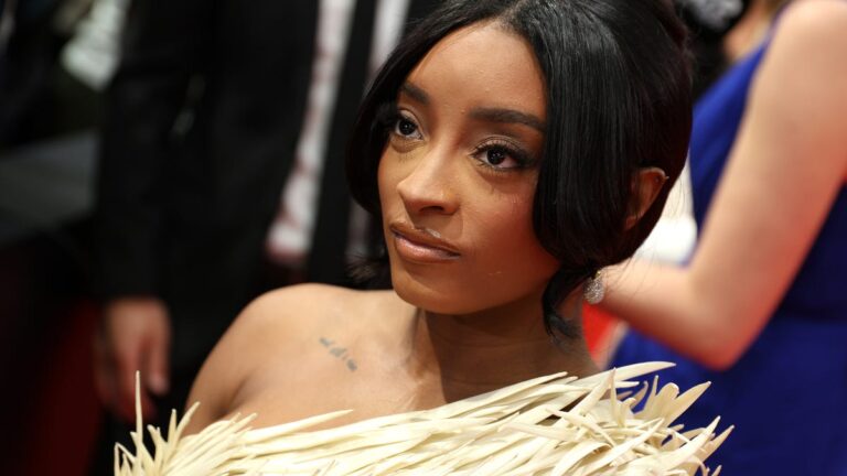 Simone Biles sets record straight about Swift, Kelce wedding invite - USA Today