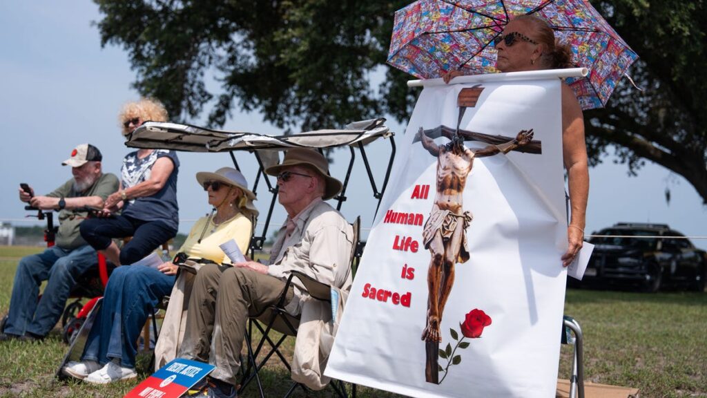 See protesters outside Florida State Prison during an execution - Tallahassee Democrat