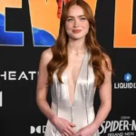 Sadie Sink’s Plunging Prada Dress Dips Ridiculously Low Front & Back - theFashionSpot