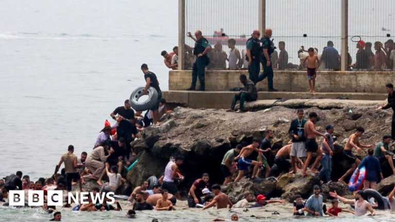 Spain sending troops as thousands enter enclave of Ceuta from Morocco - BBC