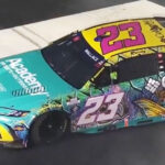 Bubba Wallace spins after contact with Ty Gibbs during Quaker State 400 Stage 2 - On3