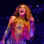 Shakira shines in a red fringed bikini as she soaks up the Miami sun - HOLA