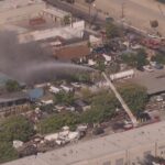 Fire engulfs 10 cars at Pacoima salvage yard - CBS News