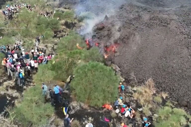Hikers venture dangerously close to lava as Mount Etna erupts again - AOL.com