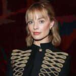 Margot Robbie’s Plunging Urban Outfitters Jumpsuit Hangs by Just 2 Strings - AOL.com
