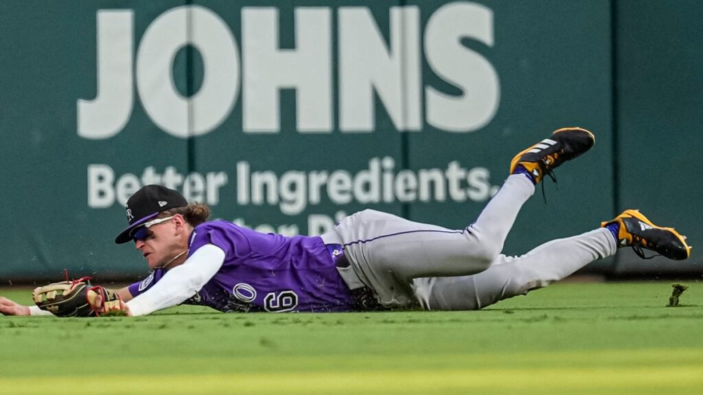Rockies manager said he's benching rookie center fielder for flipping off Braves crowd - USA Today