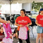 Be Strong International serves community members at food drive, backpack distribution - Miami's Community News
