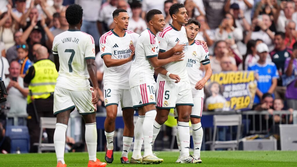 Video: clean four-goal haul and top spot for Real Madrid: Real Madrid flex their muscles against Malaga - Goal.com
