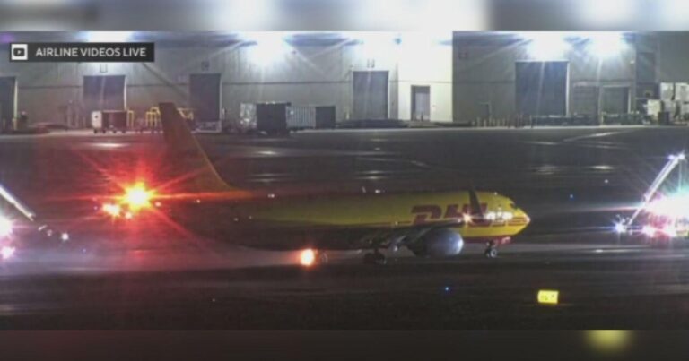 Video shows DHL cargo plane making fiery landing at LAX after experiencing issue with brake system - CBS News