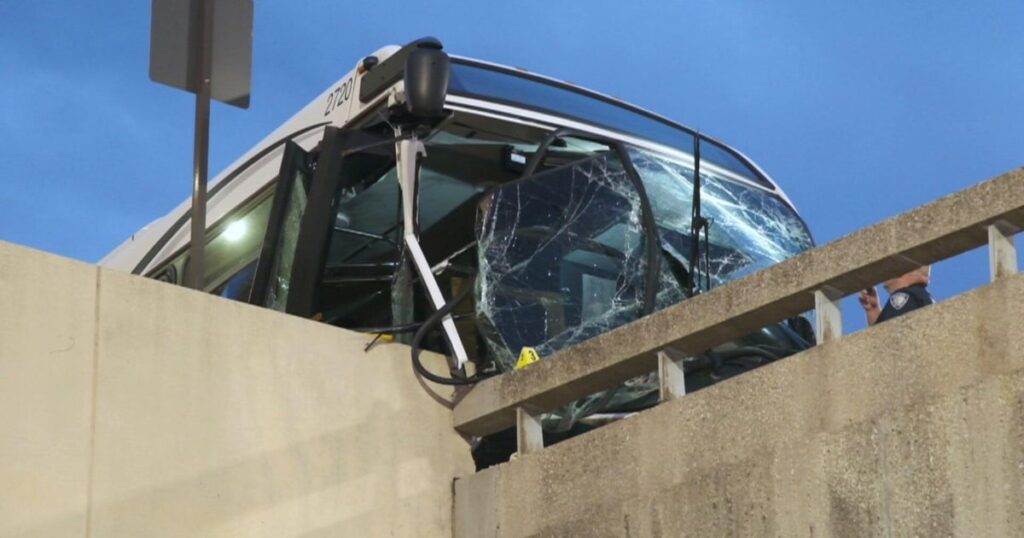Crash at Newark Airport injures 13 after employee shuttle bus hits concrete wall - CBS News