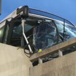 Crash at Newark Airport injures 13 after employee shuttle bus hits concrete wall - CBS News