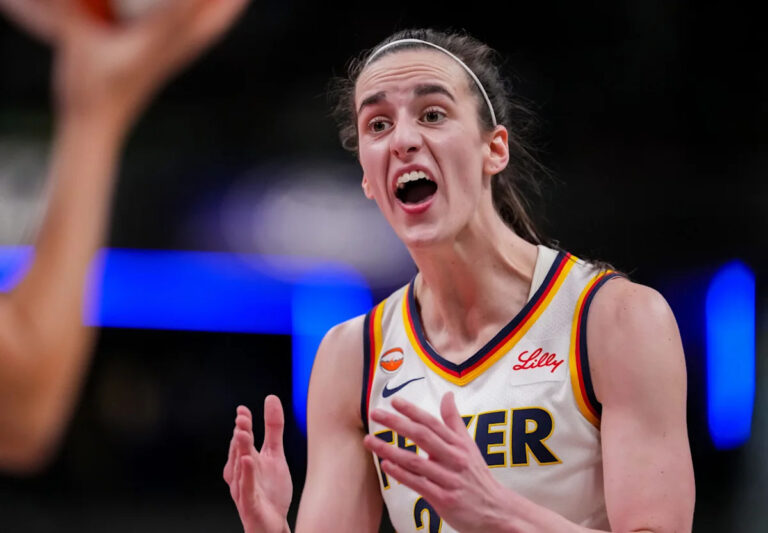 Caitlin Clark flaunts retro-inspired pregame outfit for Fever-Wings game - Yahoo Sports