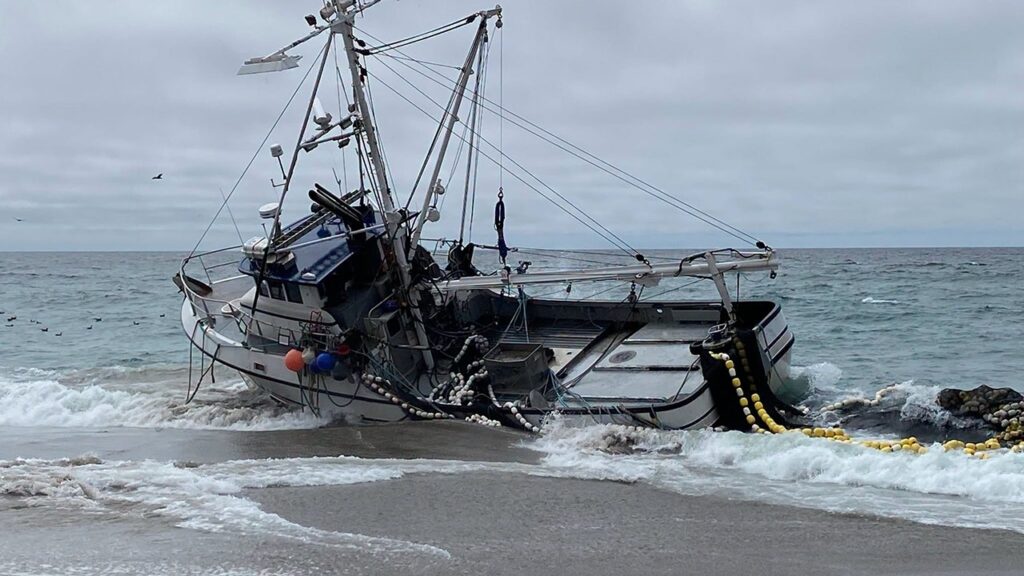 Massive fishing boat runs aground at popular beach with 1,000 gallons of diesel on board - Fox News