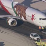 Southwest flight lands safely at Midway International Airport after nose gear tires blow out - CBS News