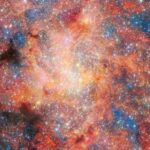 Newly discovered "black hole star" could solve mystery of strange red dots spotted in the early universe - CBS News