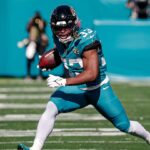 Week 1 Fantasy Football Waiver Wire Debate: Bhayshul Tuten Vs. Chris Rodriguez - Sports Illustrated
