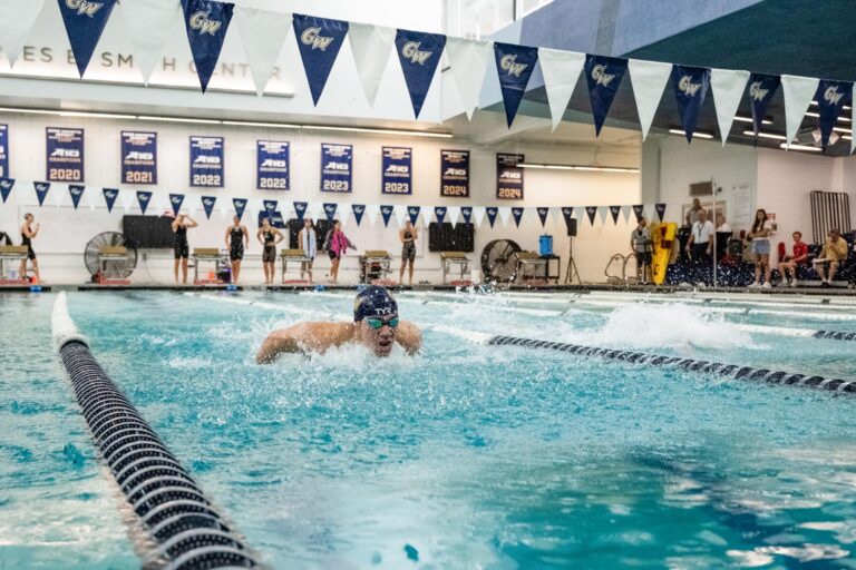 Swimming and diving warms up for another championship chase - The GW Hatchet