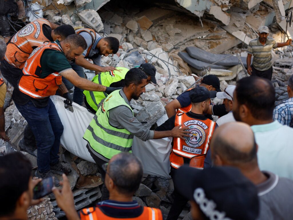 Gaza building collapse kills 12, traps dozens under rubble - Al Jazeera