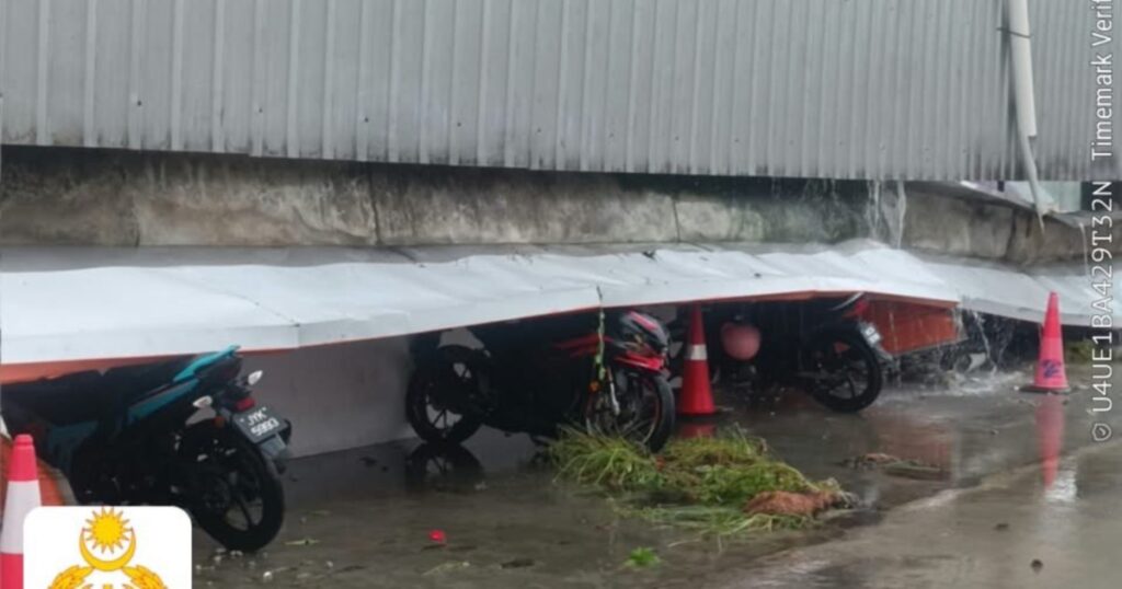 Supermarket awning collapses during heavy rain, damages three motorcycles - NST Online