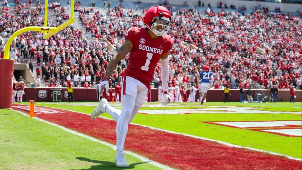 WATCH: Oklahoma's Isaiah Sategna scores on 88-yard punt return with assist from crushing block - sportingnews.com