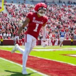 WATCH: Oklahoma's Isaiah Sategna scores on 88-yard punt return with assist from crushing block - sportingnews.com