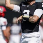 Jared Curtis fumbles, throws interception in first half of first Vanderbilt football start - The Tennessean