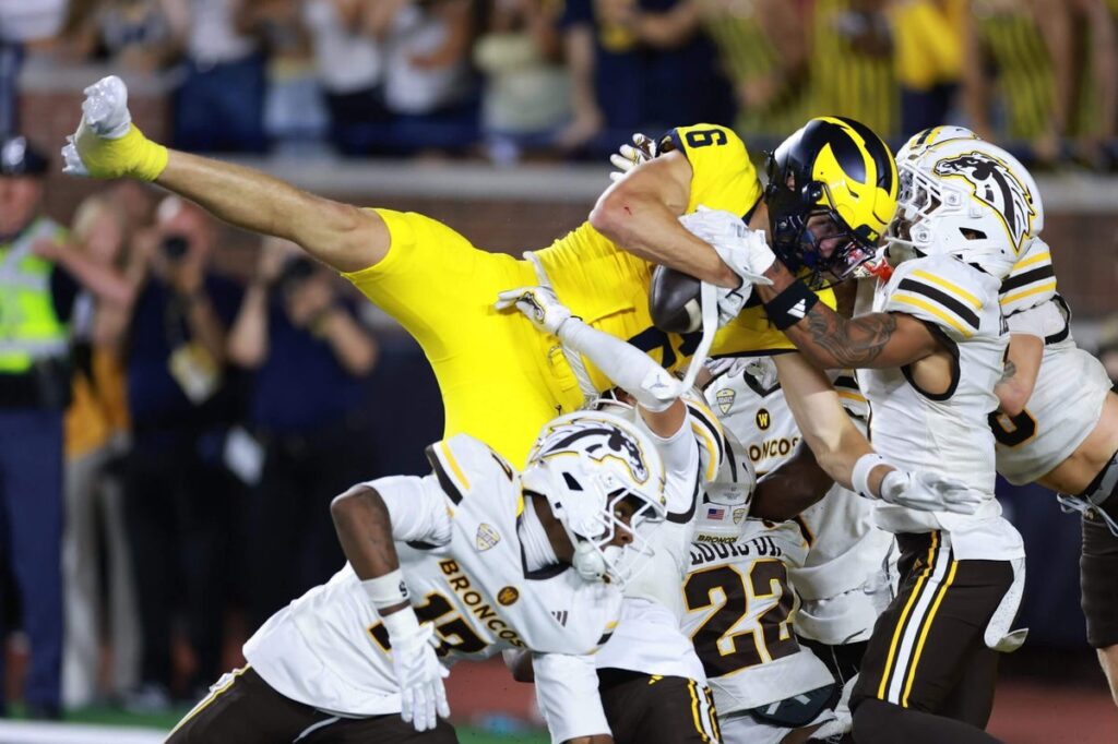 Michigan’s last-gasp miracle by Bryce Underwood saves Whittingham debut from disaster - The New York Times