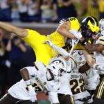 Michigan’s last-gasp miracle by Bryce Underwood saves Whittingham debut from disaster - The New York Times
