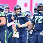 Sam Darnold injures hip on first drive of opener; Drew Lock, defense survive Patriots - The New York Times