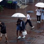 Rainy weather doesn’t stop US Open-goers from getting their tennis fix - nypost.com