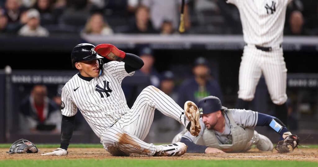 Lombard's incredible slide, tiebreaking homer lift Yanks over Rays - CBS News
