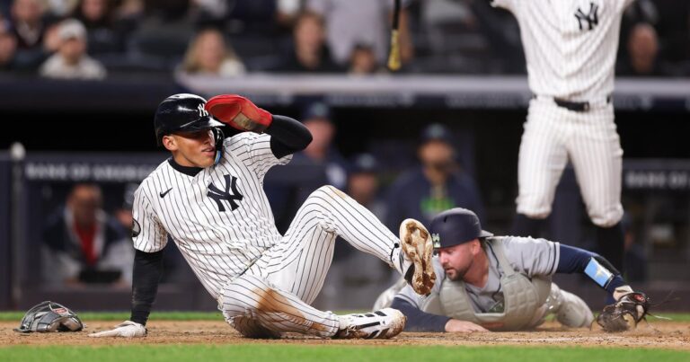 Lombard's incredible slide, tiebreaking homer lift Yanks over Rays - CBS News