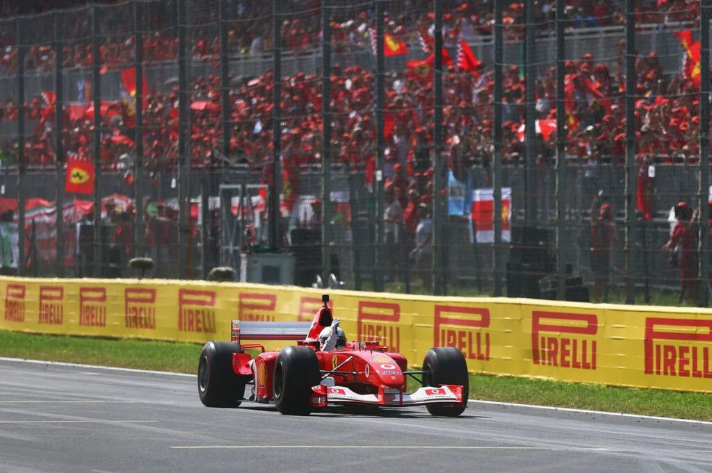 WATCH: Sebastian Vettel pays emotional Michael Schumacher tribute in Ferrari F2002 - "I felt him a lot today" - Yahoo Sports Canada