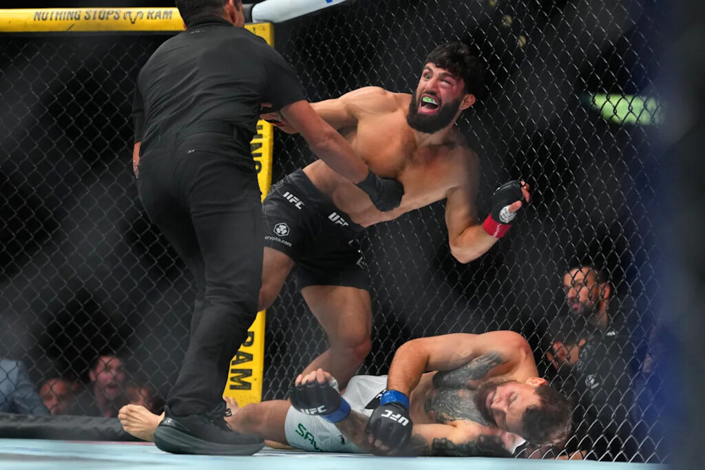 Arman benches Ilia Topuria, Charles Oliveira with thunderous knockout win at UFC 331 — ‘Title shot secured’ - Yahoo Sports
