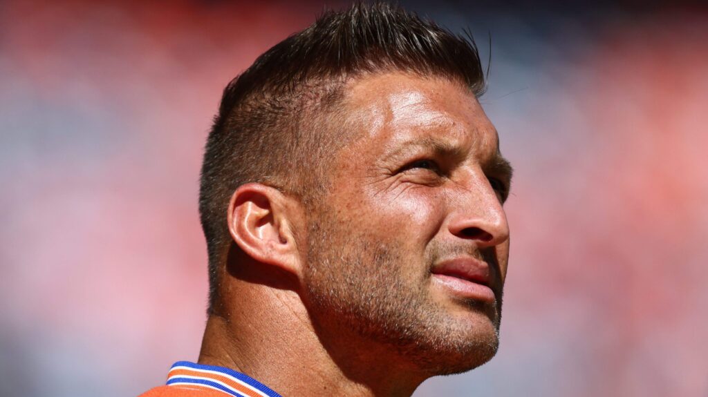 Former Broncos Tim Tebow, Russell Wilson Linked to Alleged Faith-Based ‘Scam’ - heavy.com
