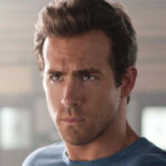 Ryan Reynolds Says He Owes His Entire Career To An Infamous Superhero Flop - SlashFilm