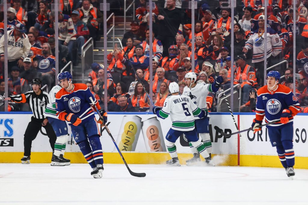 Paul Cotter scores in OT as the Canucks beat the Oilers 6-5 in the opener - michigansthumb.com