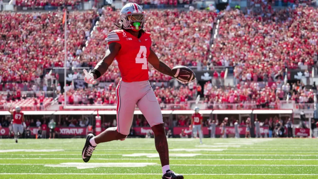 Jeremiah Smith breaks Chris Olave’s Ohio State record with another historic touchdown - sportingnews.com