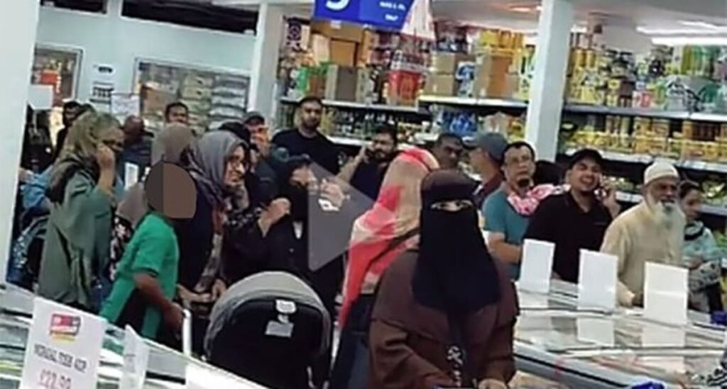 Customers in Asian supermarket in UK filmed waiting in separate male and female queues - AOL.co.uk