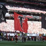The Falcons helped a microphone operator after collision instead of celebrating a TD - USA Today