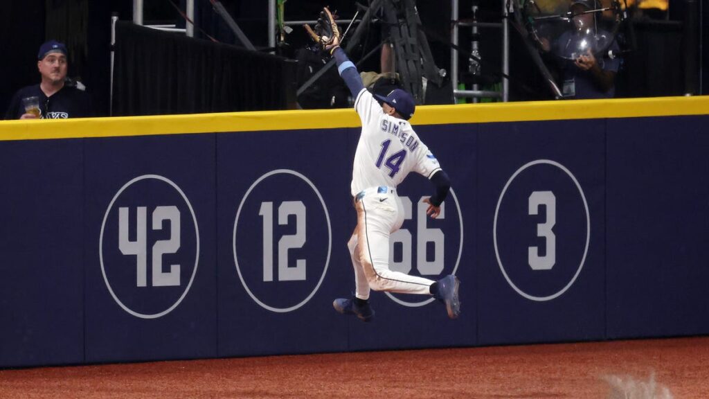 Watch Rays outfielder smash into wall making heroic World Series catch - USA Today