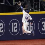 Watch Rays outfielder smash into wall making heroic World Series catch - USA Today