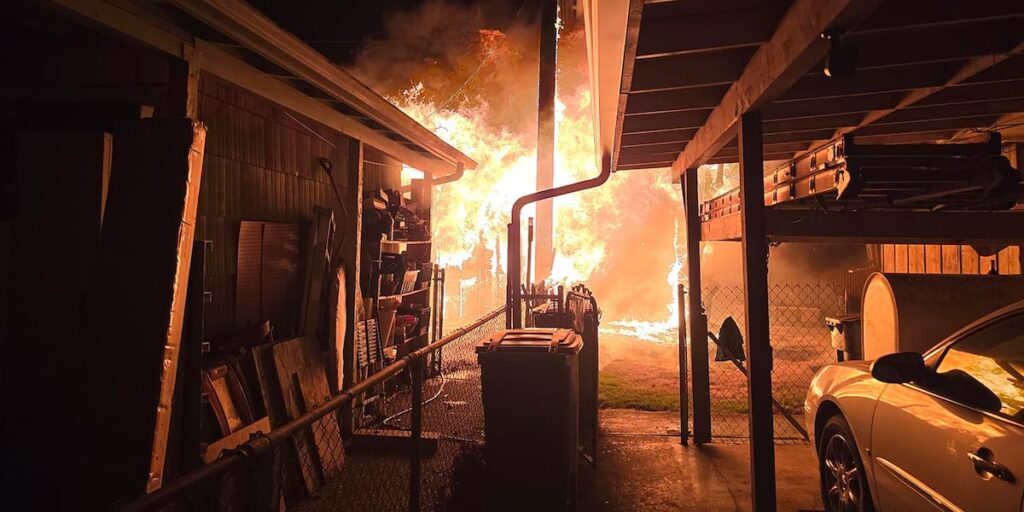 Wind-driven shed fire spreads to SE Portland home, 1 taken to hospital - KPTV