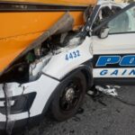 Police officer crashes patrol car into school bus stopped picking up children; 4 sent to hospital - WBBJ-TV