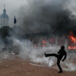 Protesters clash with police during nationwide demonstrations in France - Al Jazeera
