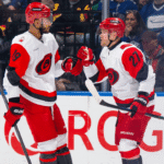 Hurricanes score six, pull away from slumping Canucks - NHL.com